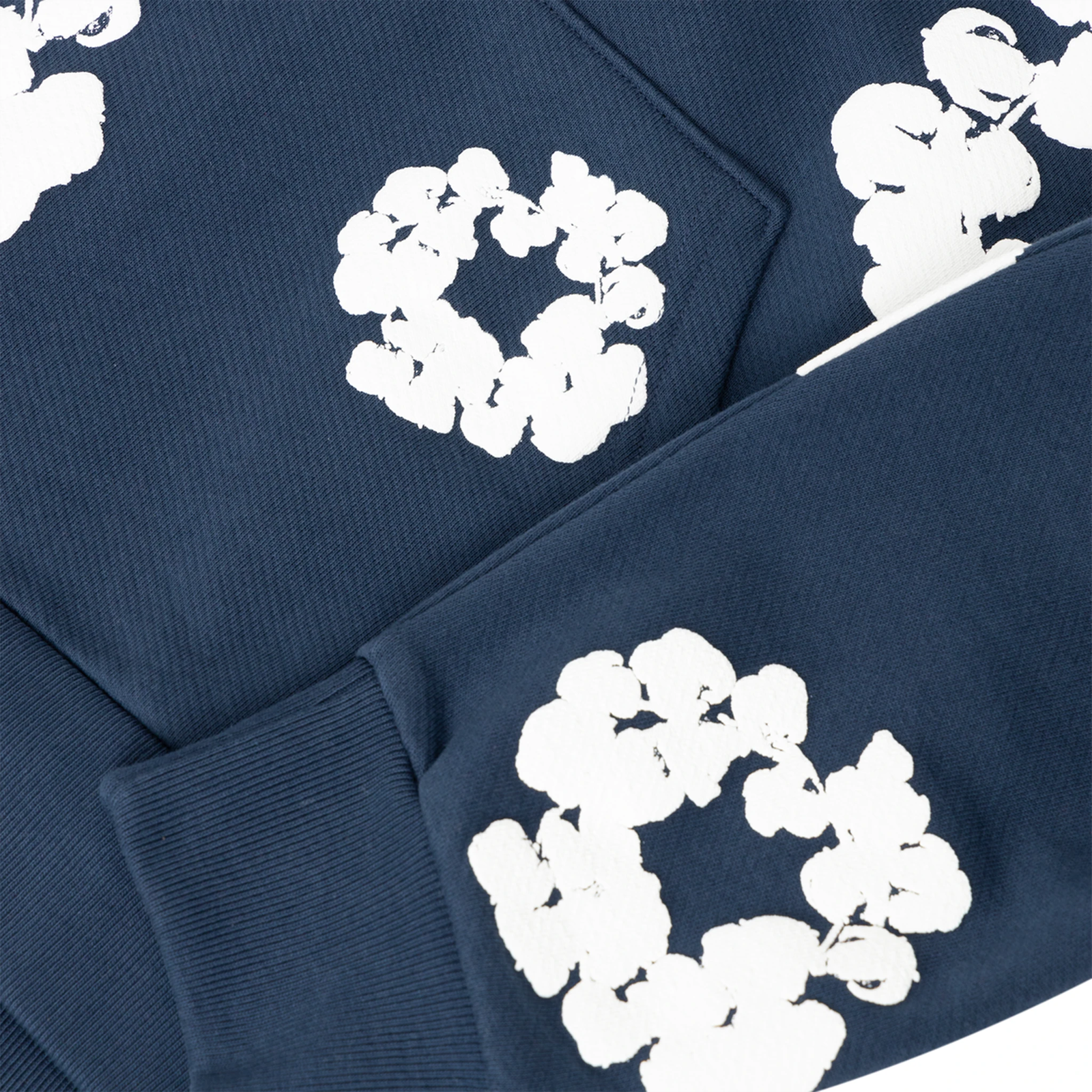 denim-tears-the-cotton-wreath-navy-hoodie-sleeve